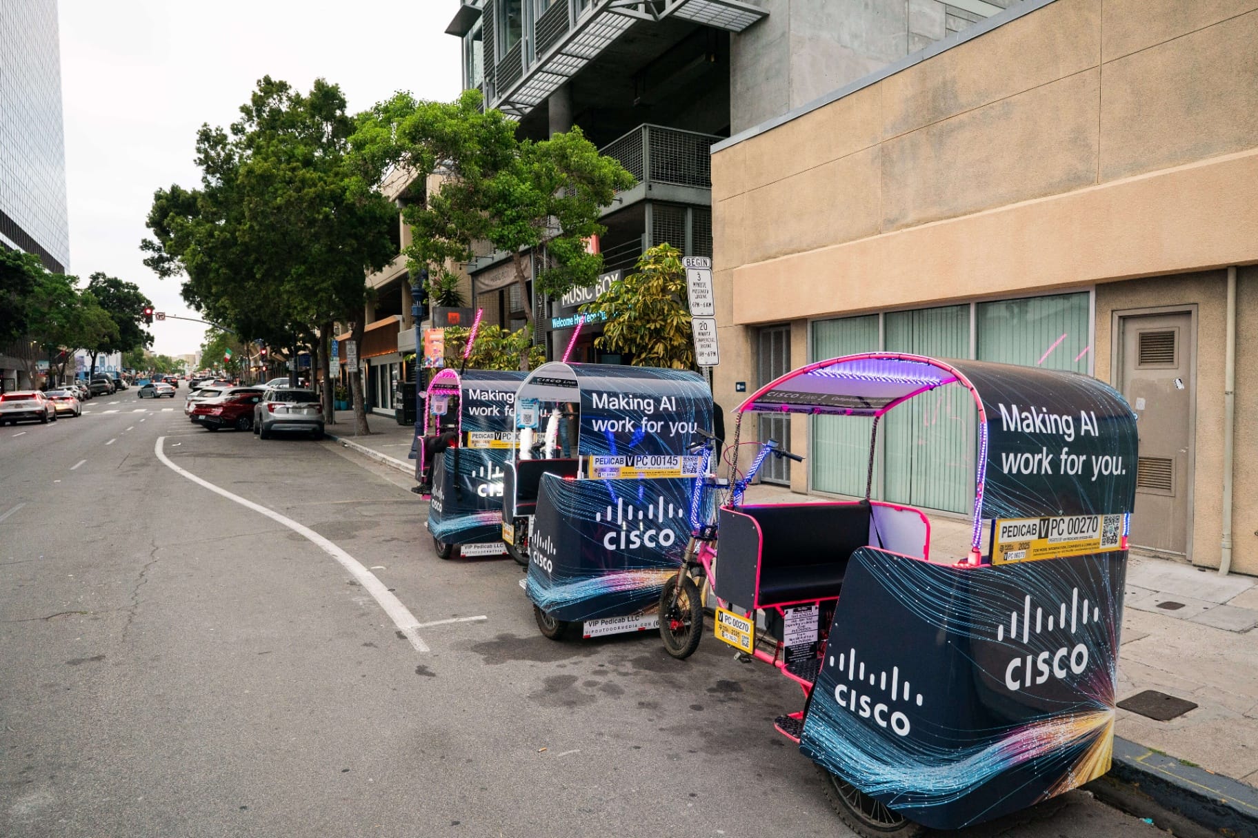 Branded pedicab fleet at a major convention with LED lights