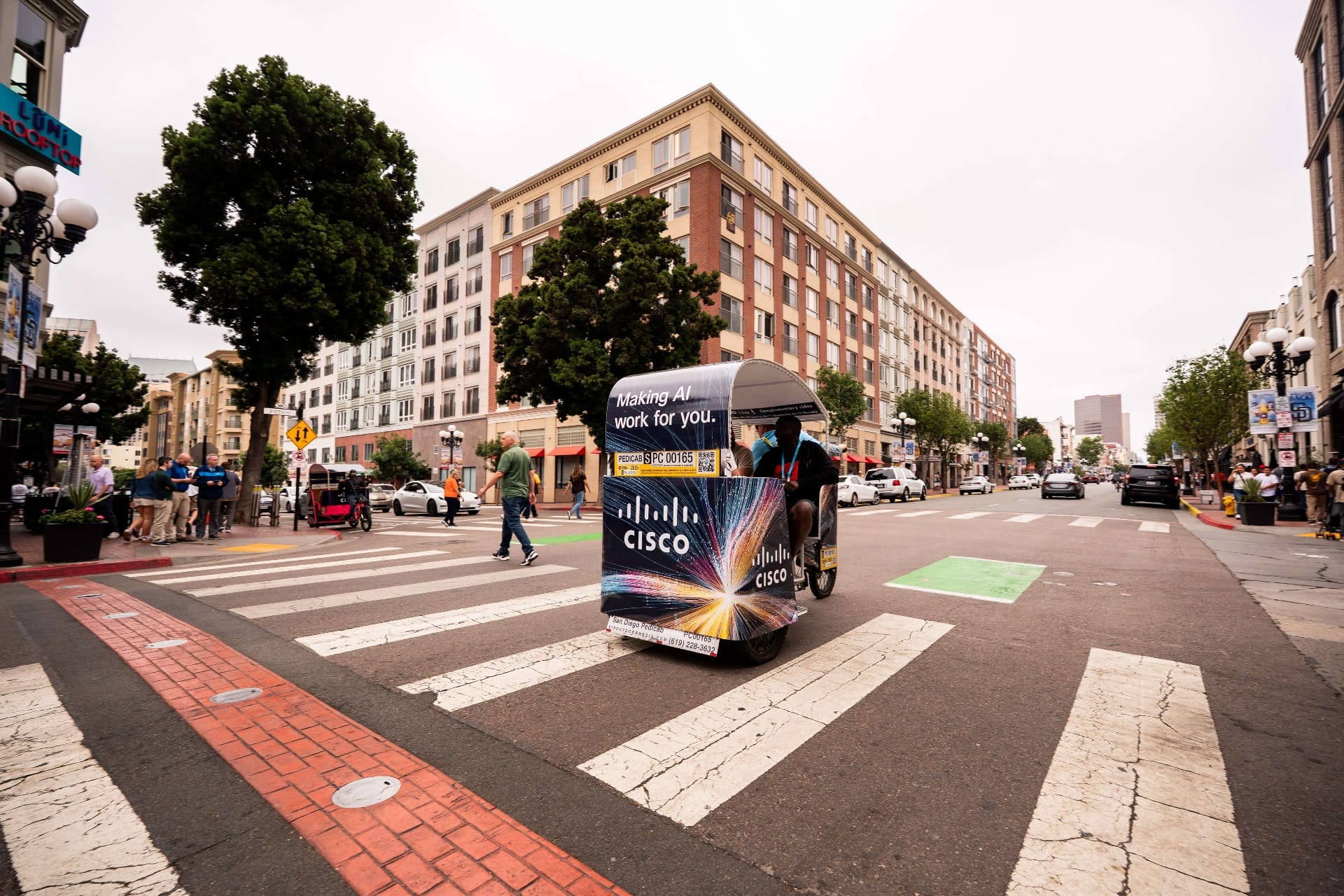 Branded pedicab advertising for TMS 2026 at San Diego Convention Center