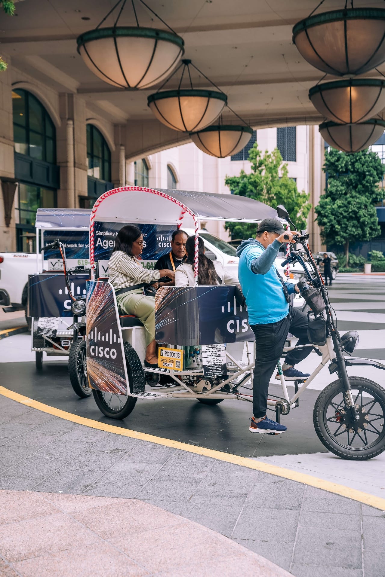 Branded pedicab hotel pickup for convention attendees San Diego