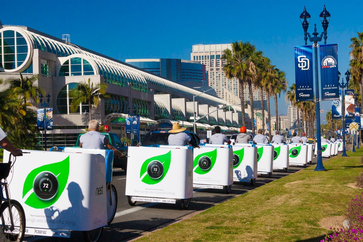 Nest branded pedicab fleet outside the San Diego Convention Center