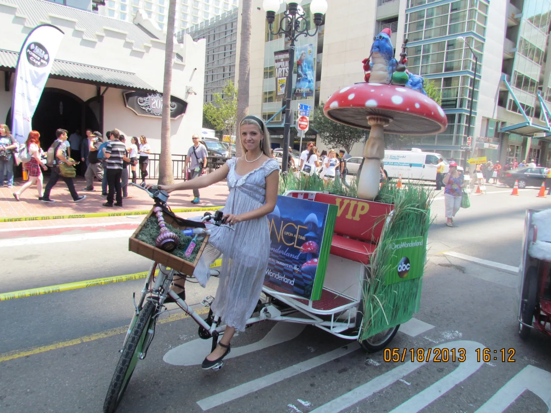 Once Upon a Time in Wonderland themed pedicab with mushroom prop at Comic-Con