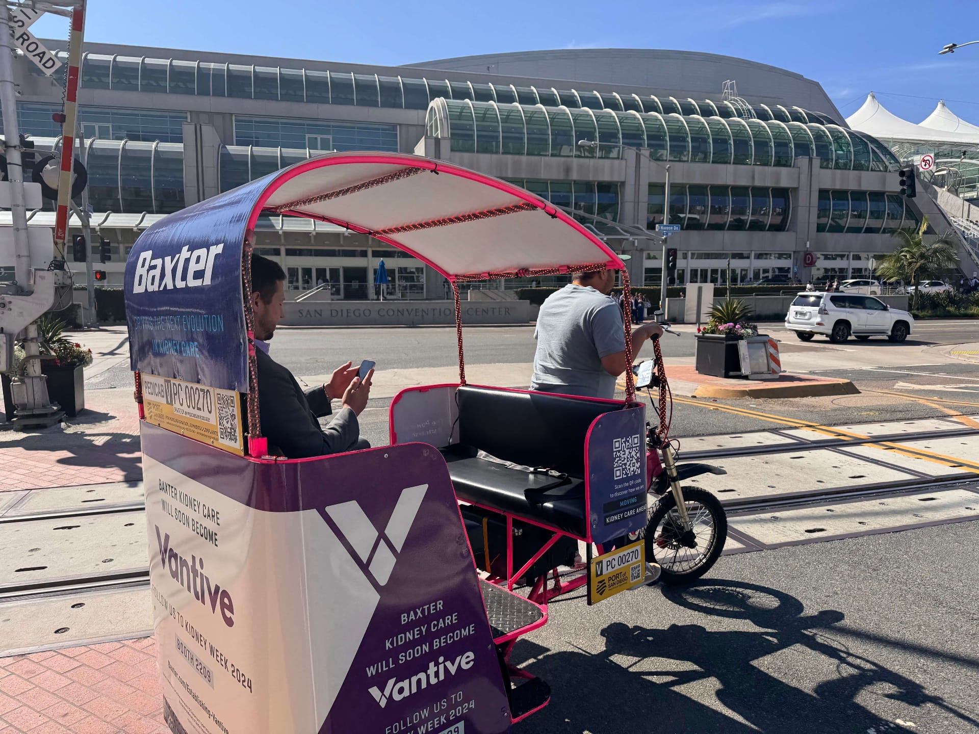 Branded pedicab advertising outside the San Diego Convention Center
