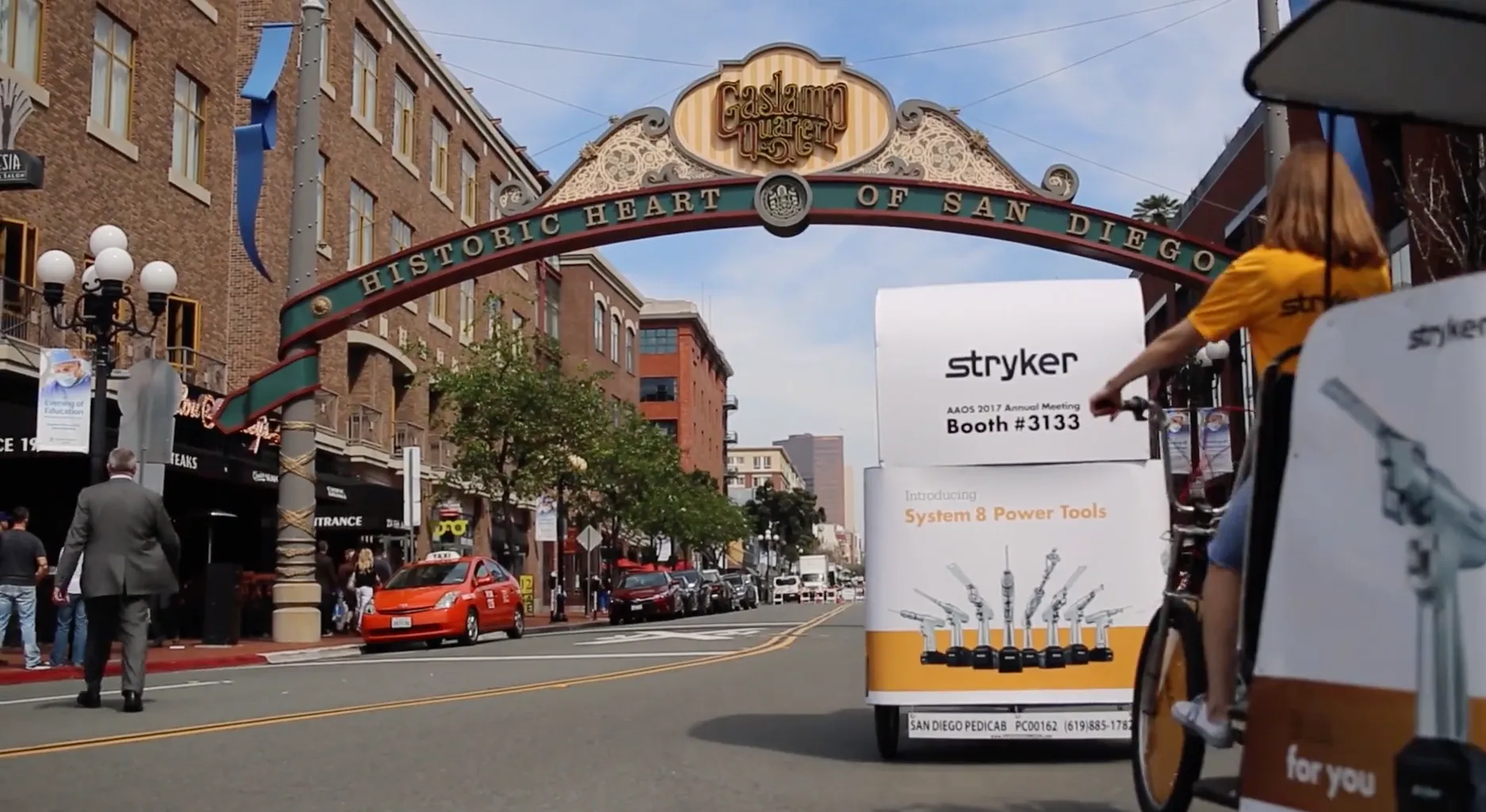 Branded pedicab advertising for OPTIMIZE 2026 at George R. Brown Convention Center