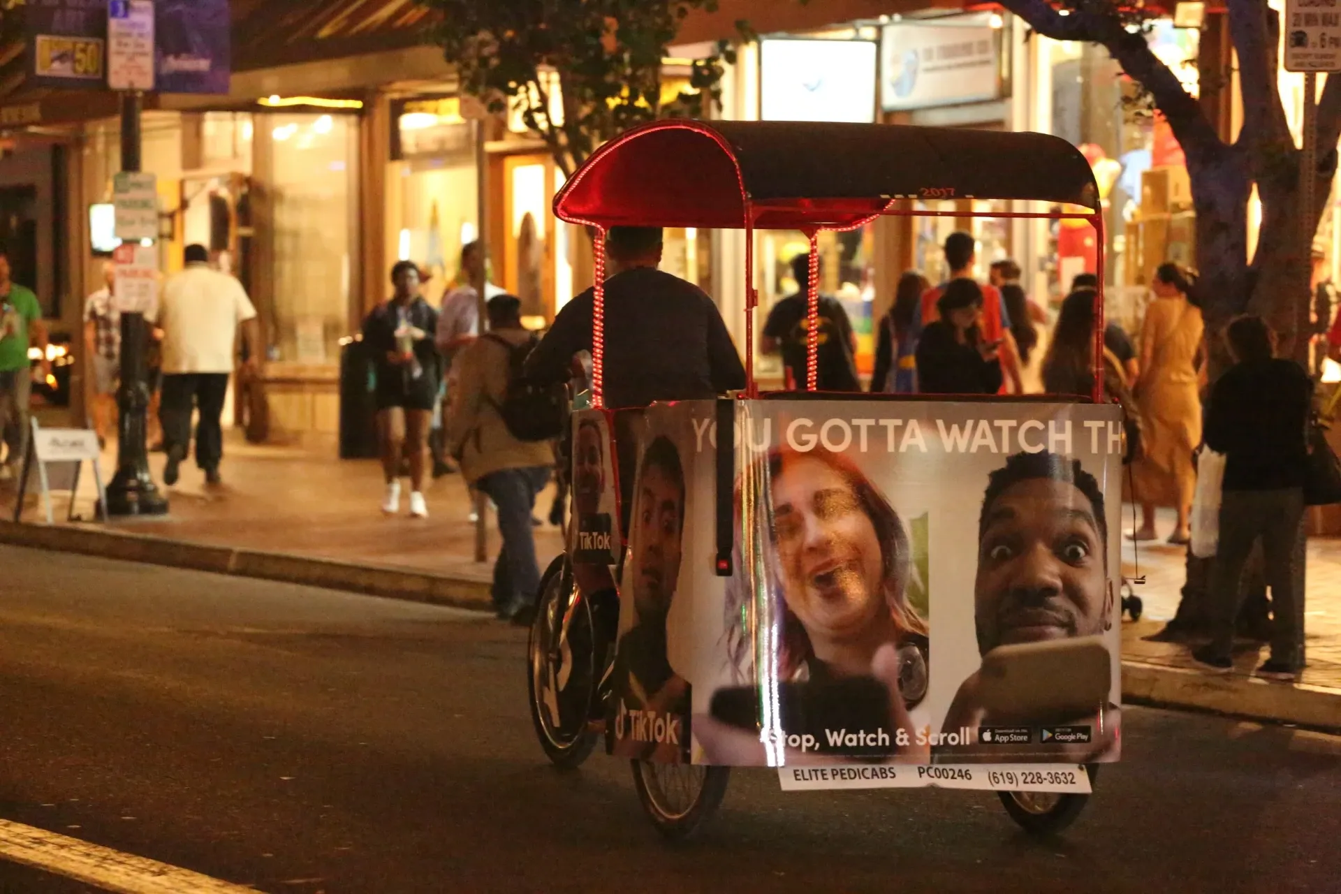 TikTok branded pedicab in the Gaslamp Quarter nightlife at Comic-Con